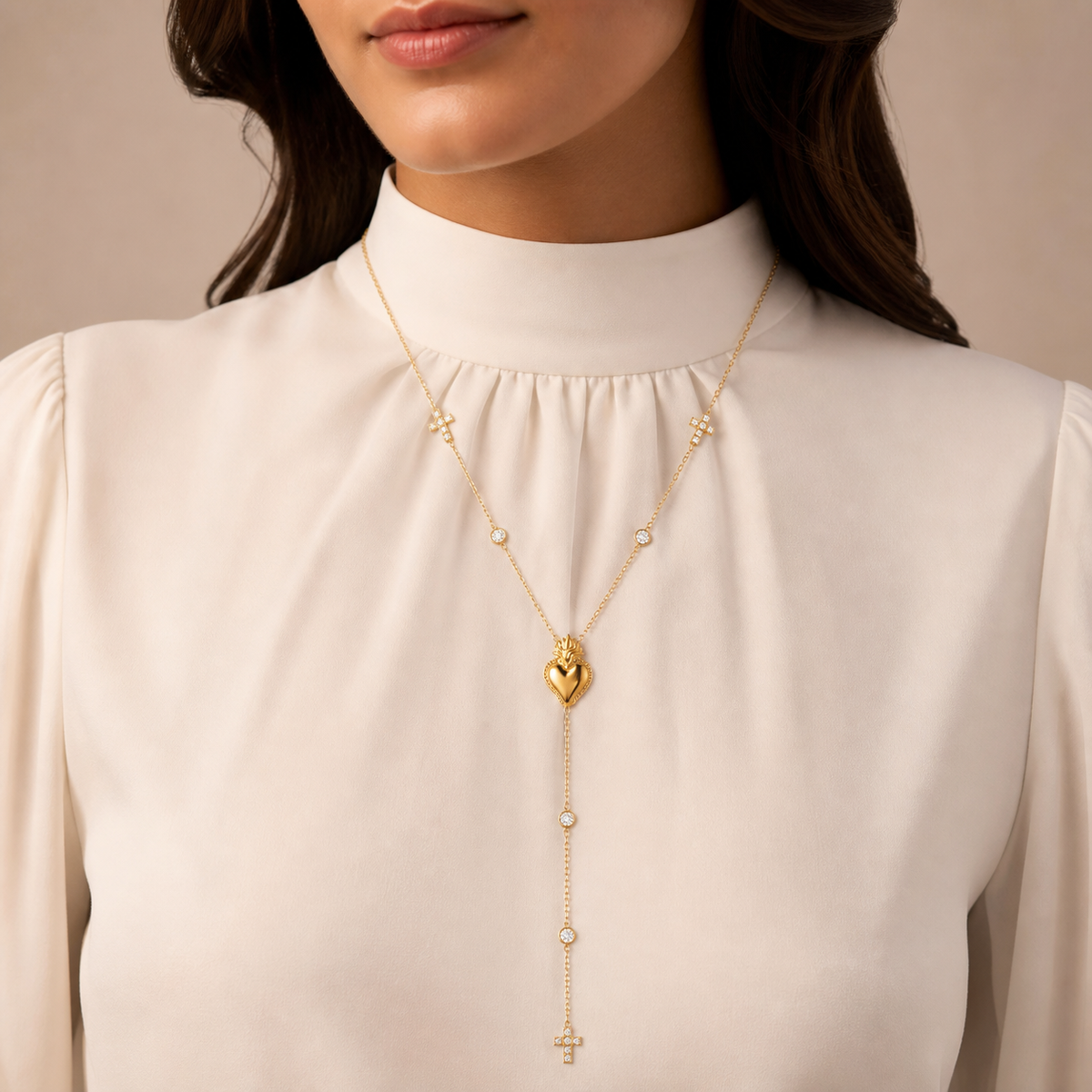 Model wearing the gold heart zircon Y necklace