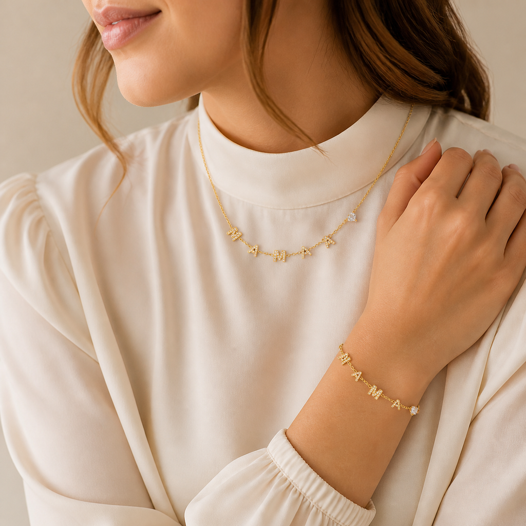 Model wearing the matching gold MAMA heart zircon necklace and bracelet