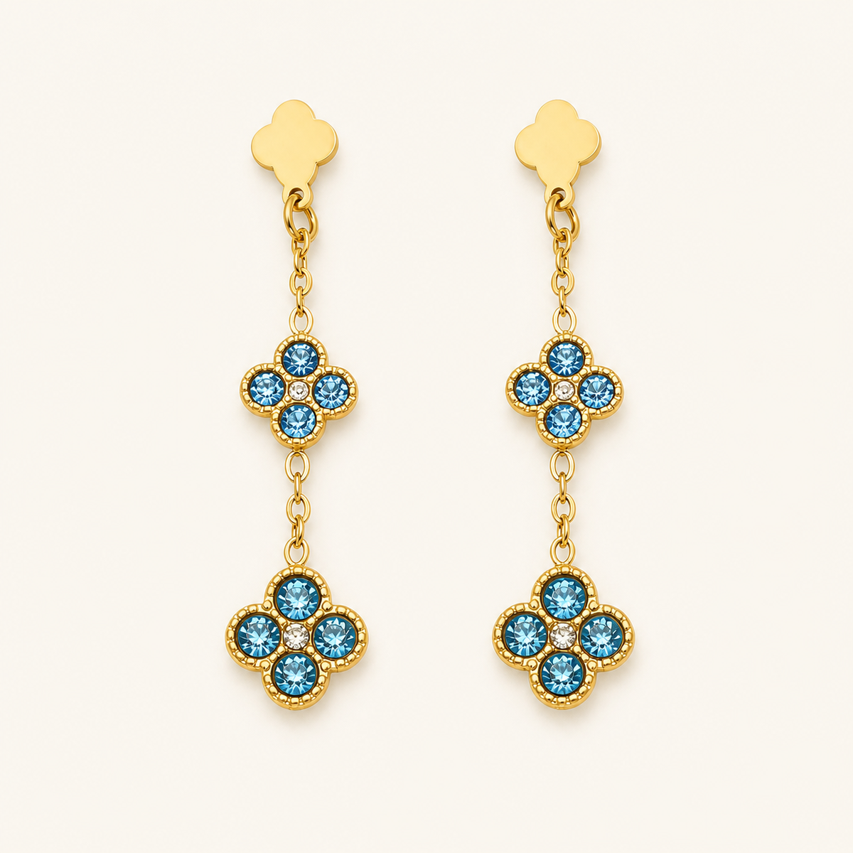 Clover Glow Zircon Earrings — blue crystals, gold