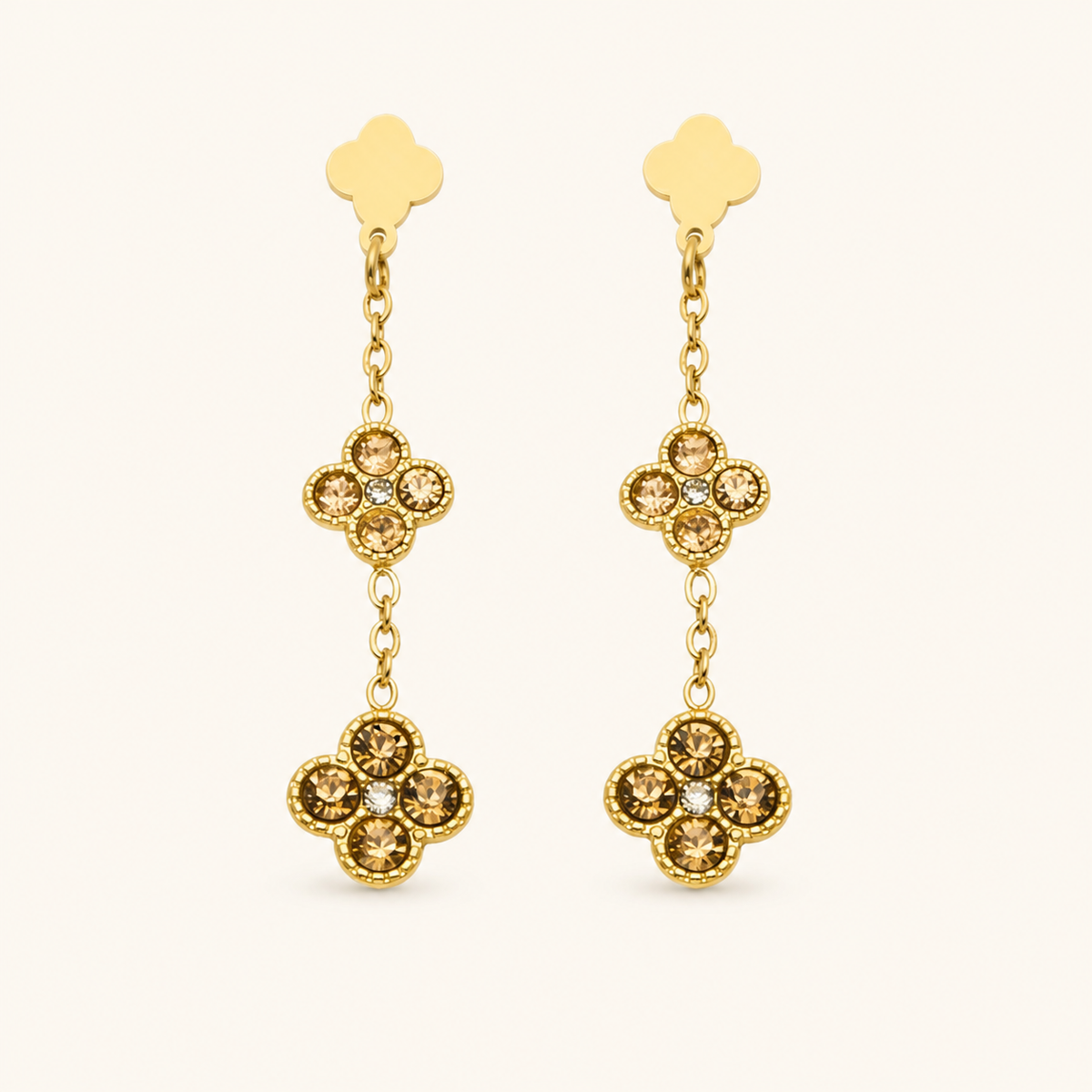 Clover Glow Zircon Earrings — champagne crystals, gold