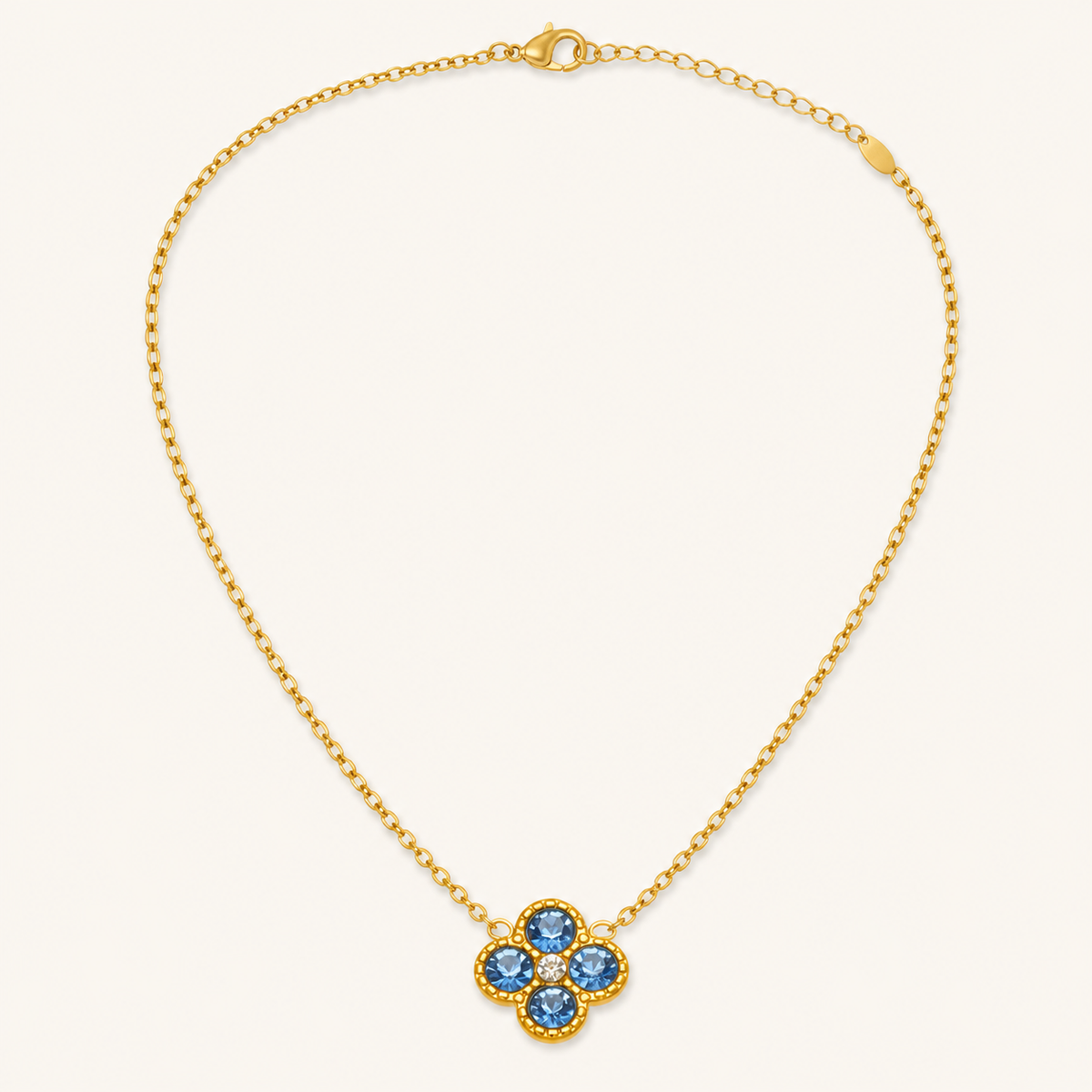 Clover of Grace blue zircon necklace in gold