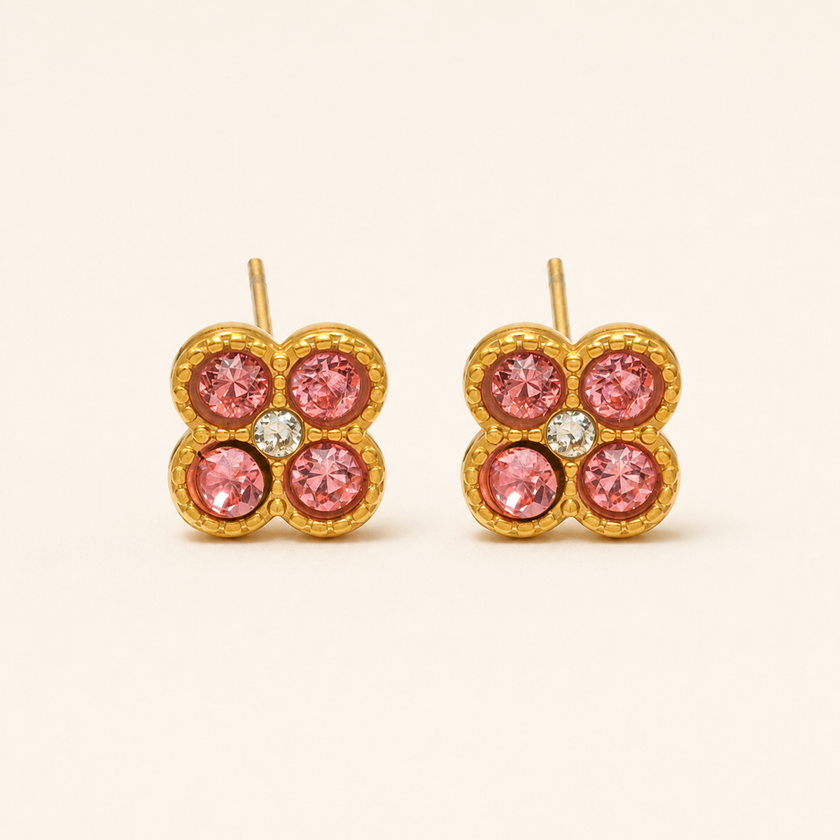 Clover of Grace magenta zircon earrings in gold
