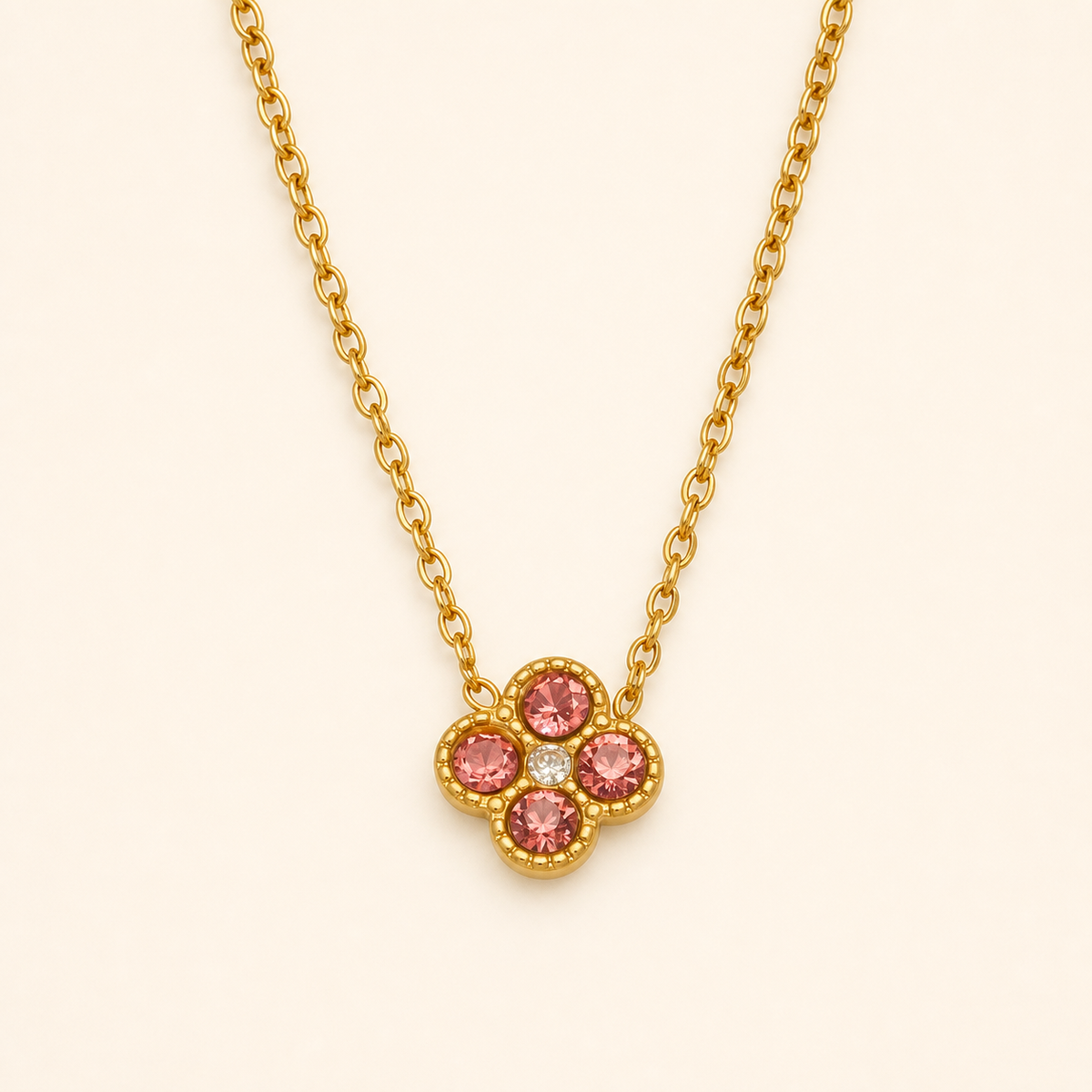 Clover of Grace magenta zircon necklace in gold