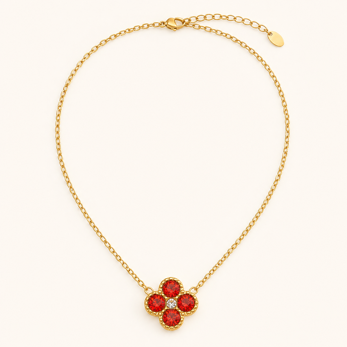 Clover of Grace red zircon necklace in gold