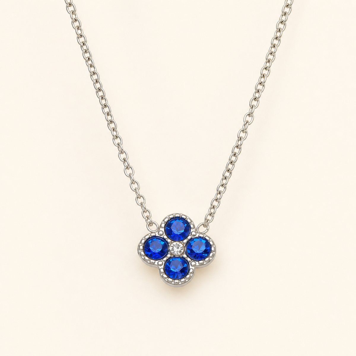 Clover of Grace sapphire blue zircon necklace in silver