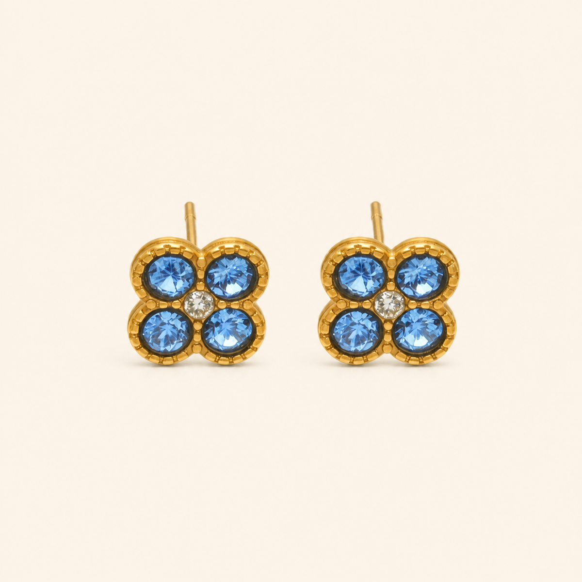 Clover of Grace sky blue zircon earrings in gold