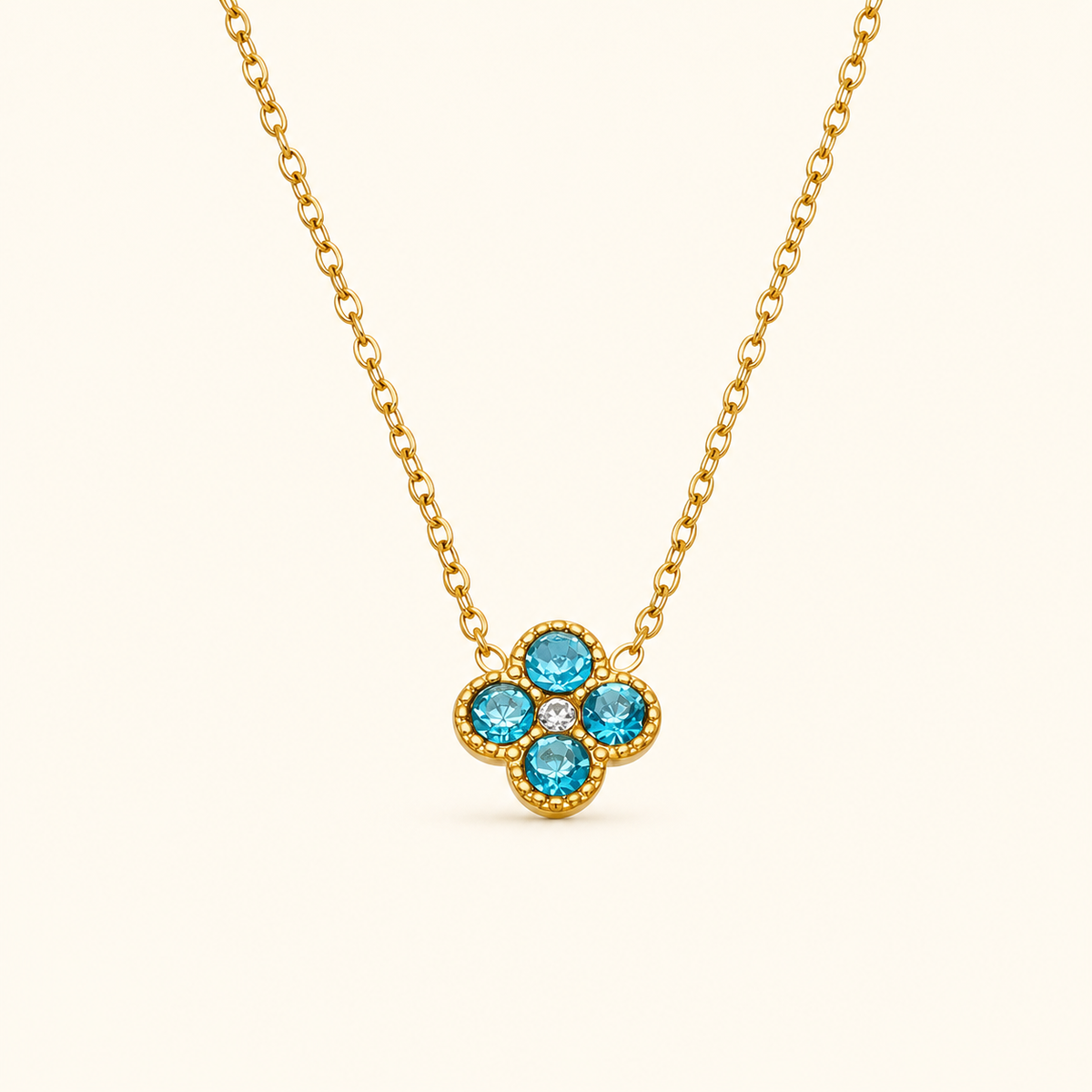 Clover of Grace sky blue zircon necklace in gold
