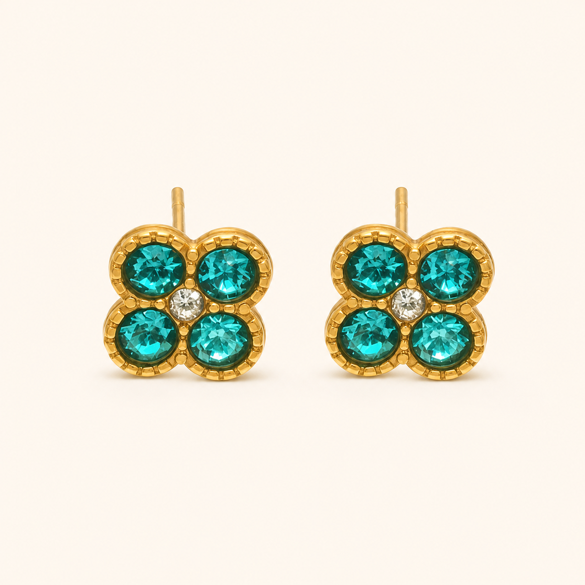 Clover of Grace teal zircon earrings in gold