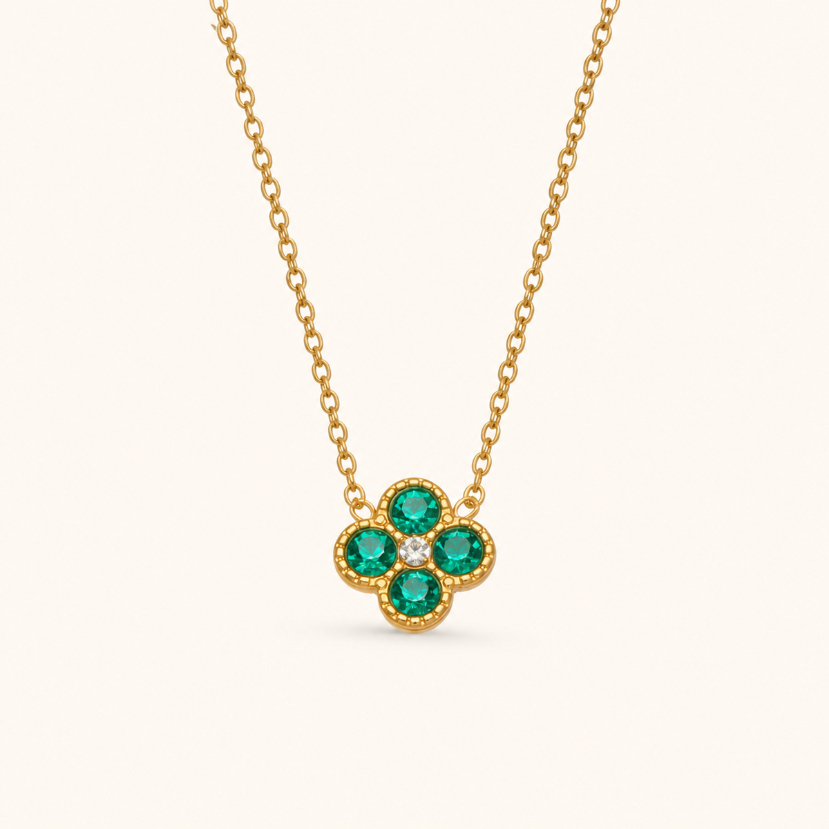 Clover of Grace teal zircon necklace in gold