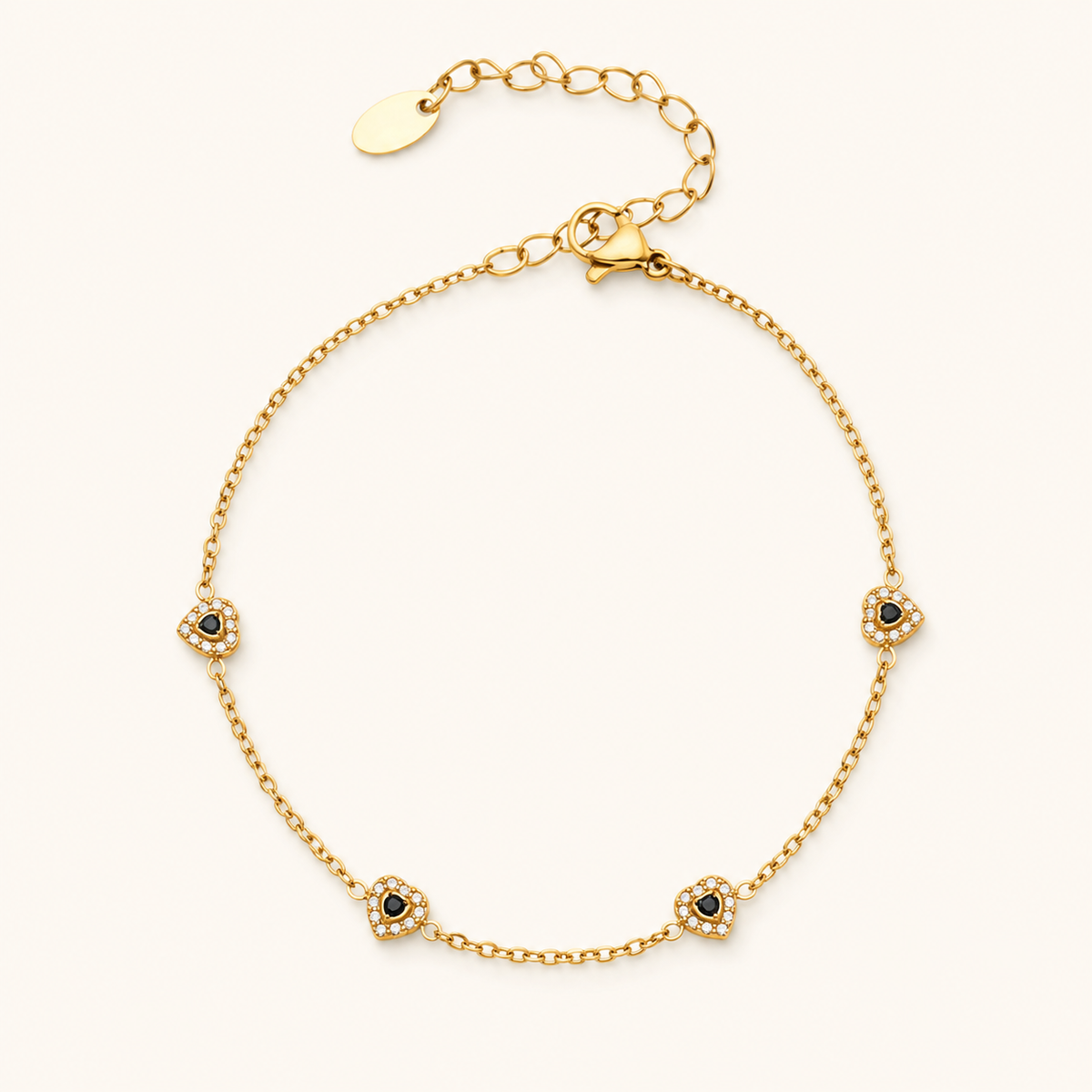Color of Love heart bracelet — black stones, gold
