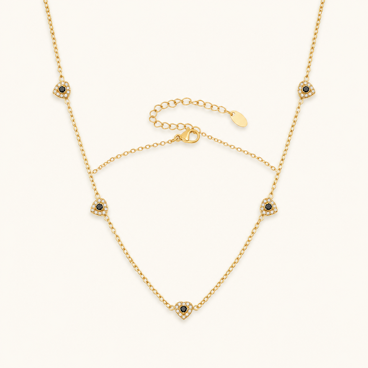 Color of Love heart necklace — black stones, gold
