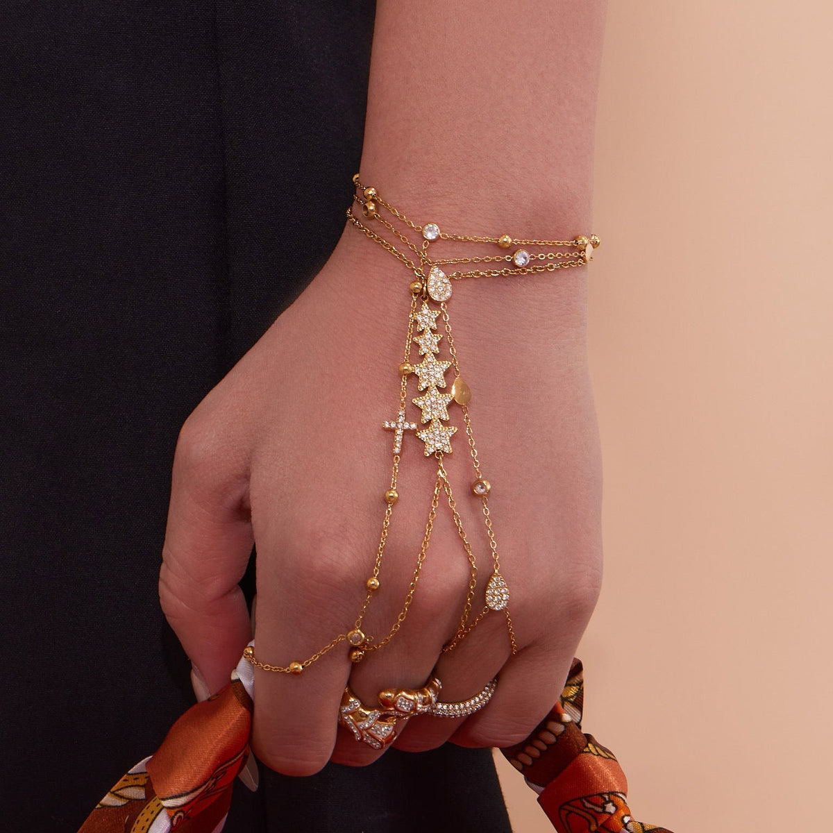 Dainty Grace Finger Chain worn by a model — Carried in Grace