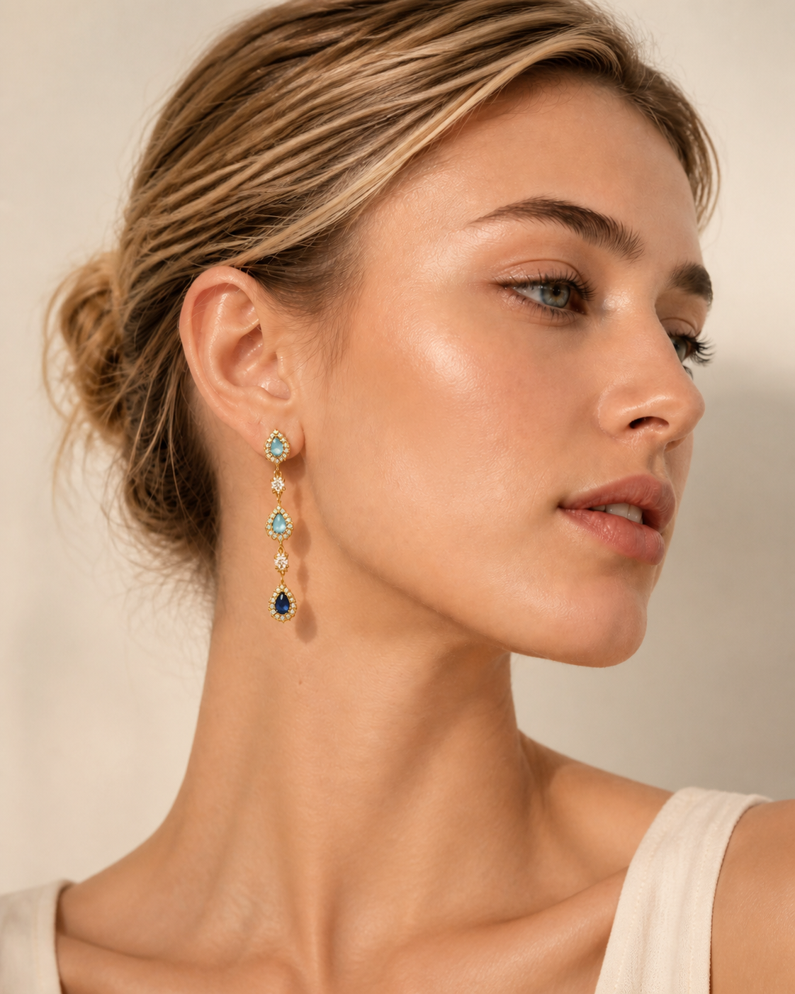 Dew of Grace Teardrop Earrings worn by a model