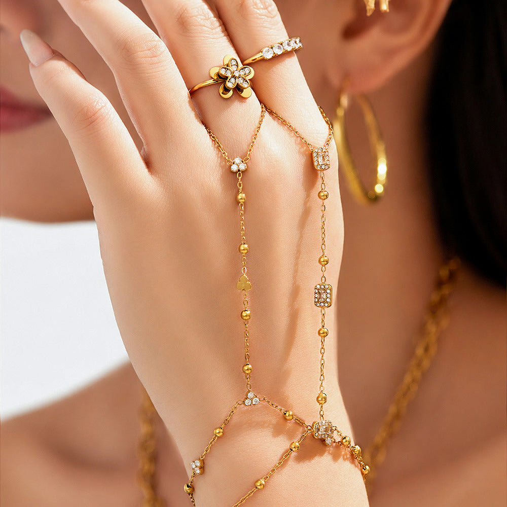 Fleur & Halo Zircon Hand Chain worn by a model — Carried in Grace