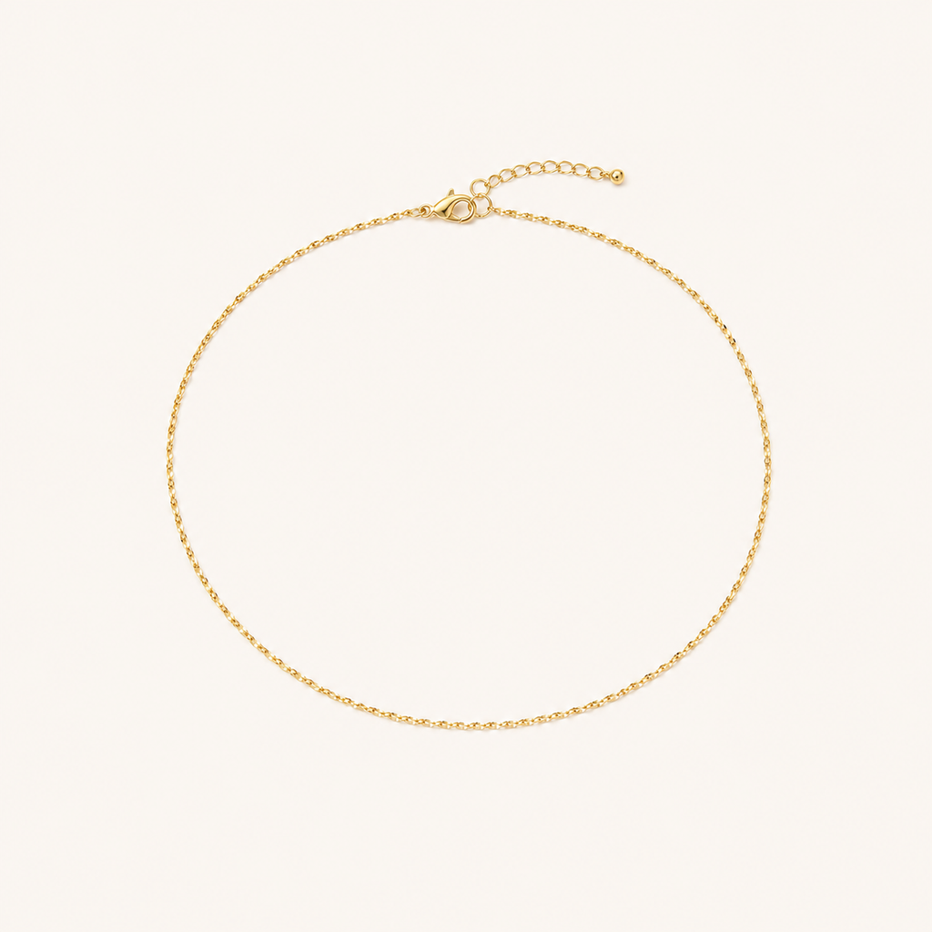 Gold Thin Starlight Chain fully visible on warm ivory background