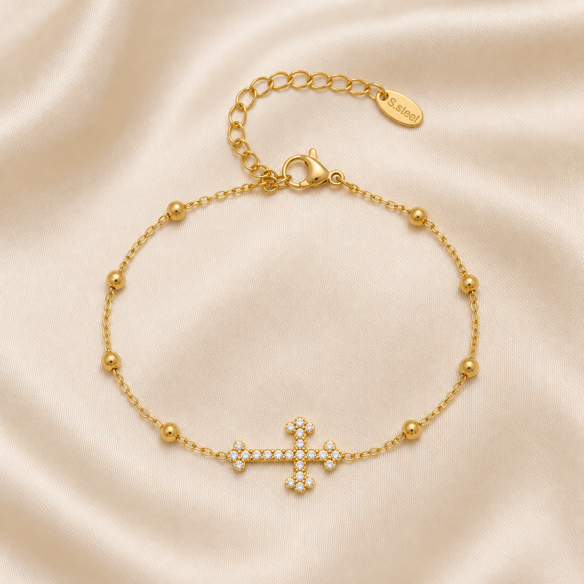 Grace Zircon Cross Bracelet on cream silk