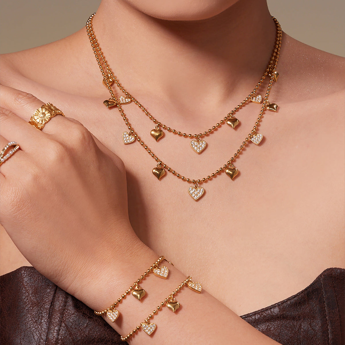 Model wearing the Heart of Grace Jewelry Collection