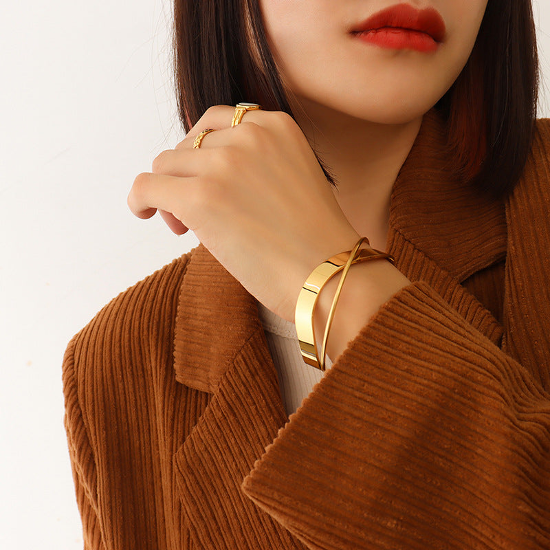 Polished Cross Open Bracelet worn by a model — Carried in Grace