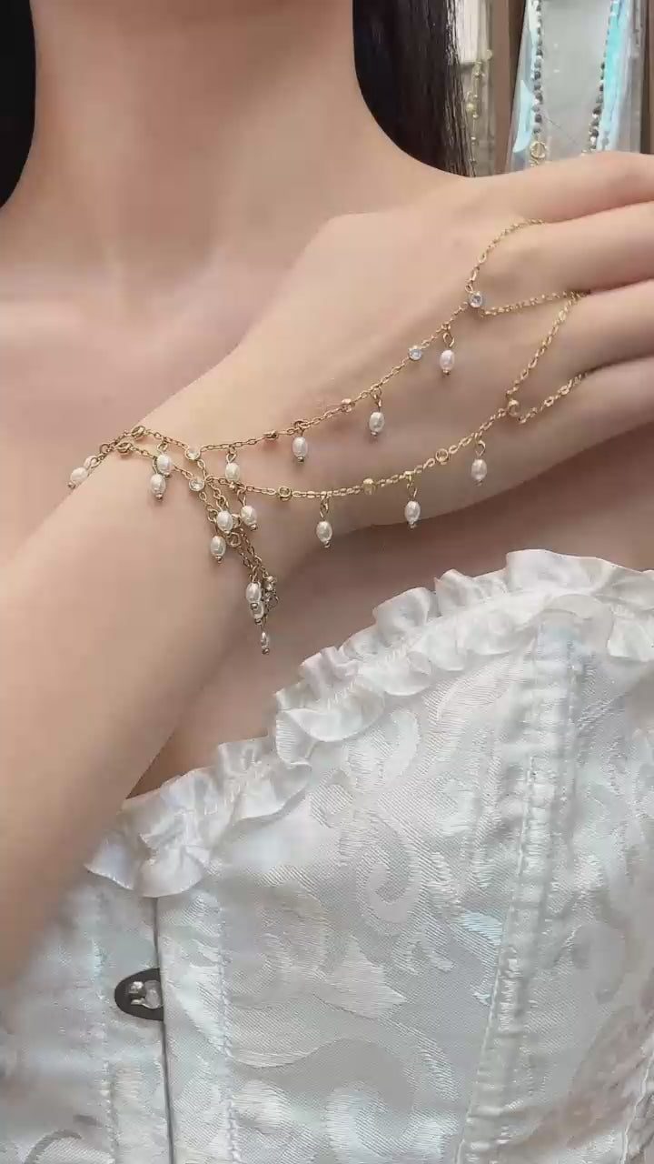 Model wearing the Pearl of Grace Hand Chain